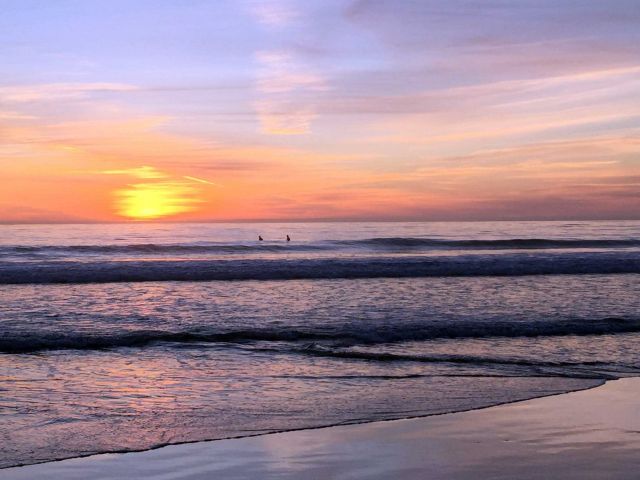 Sands surf at sunset. Credit: Brian Wolf